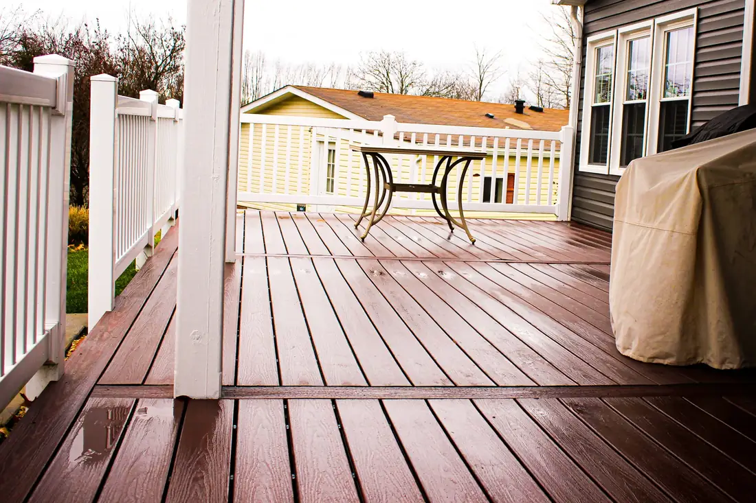 Rustic composite under cover — Oasis Custom Decks