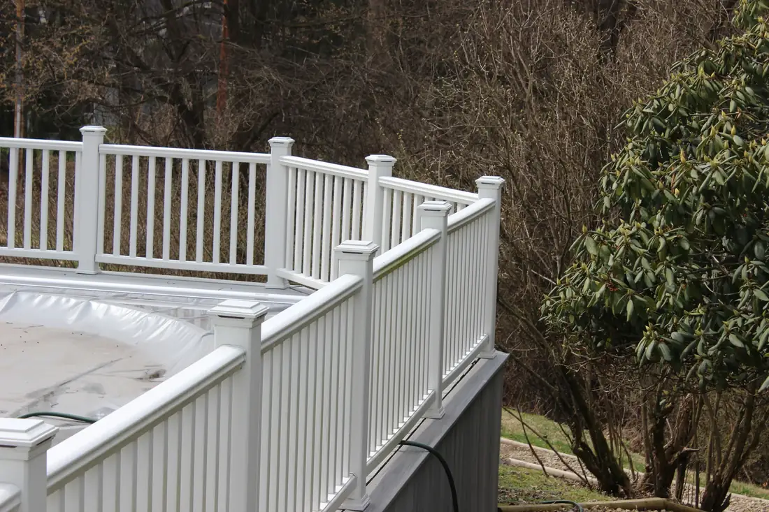White vinyl rail with lattice detail — Oasis Custom Decks