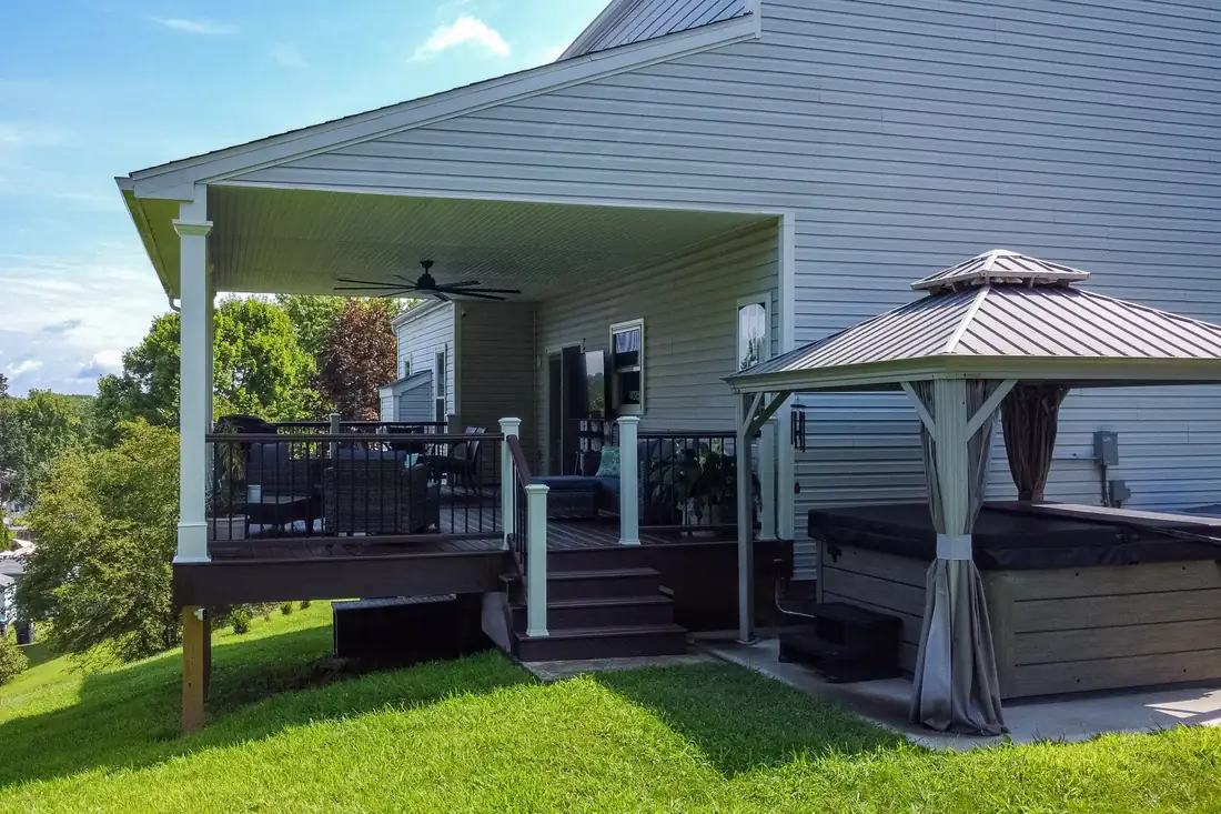 Covered deck with ceiling fan and wrapped posts — Oasis Custom Decks
