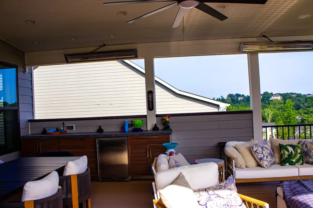Stone columns and gable roofline — Oasis Custom Decks
