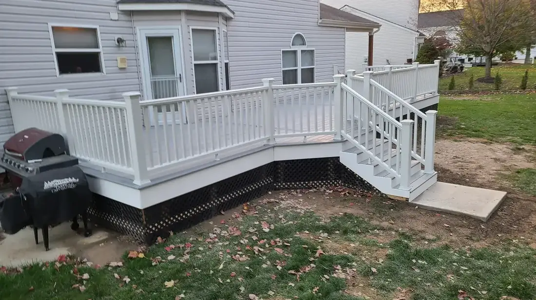 Deck wrapping a bay window — Oasis Custom Decks