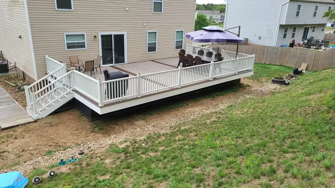 Family deck with wraparound stairs — Oasis Custom Decks